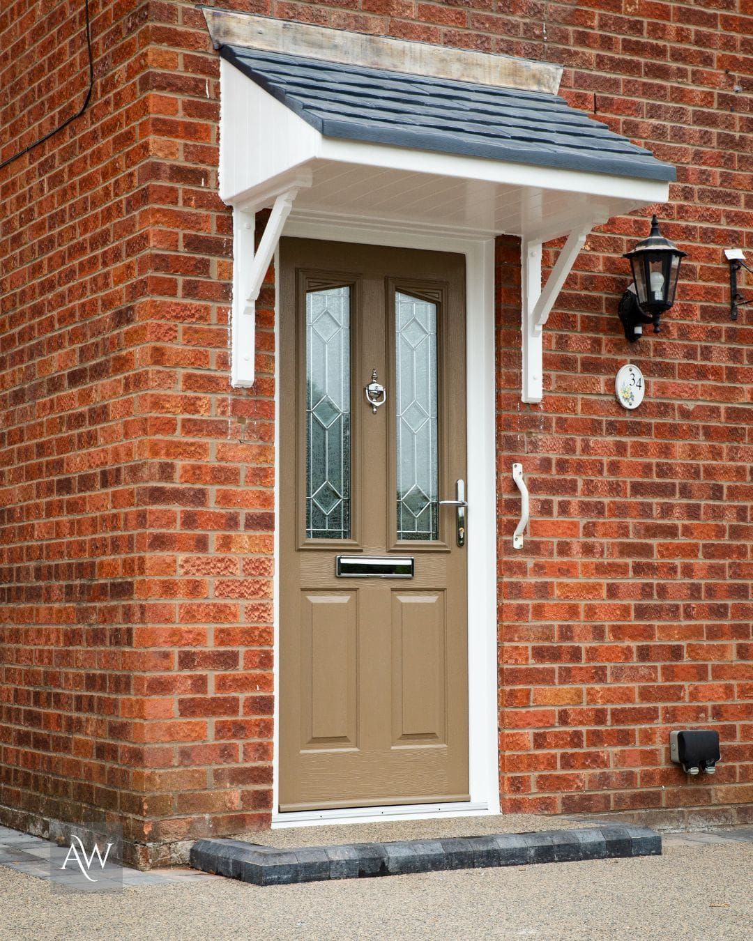 side view of the truffle brown harlech 2 compsoite door from Solidor installed by alexander windows in hazel grove