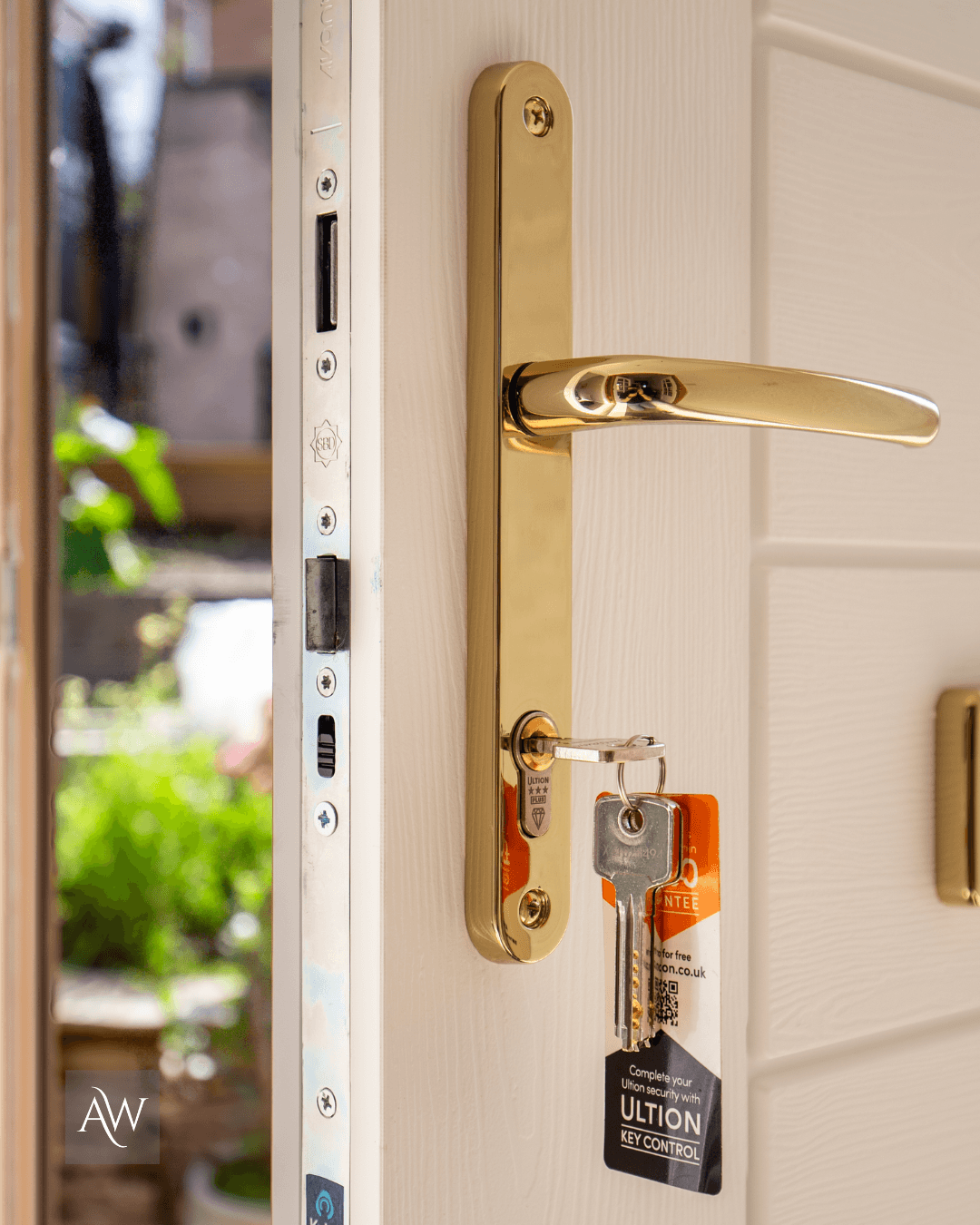 internal view of the gold handle with key in the door