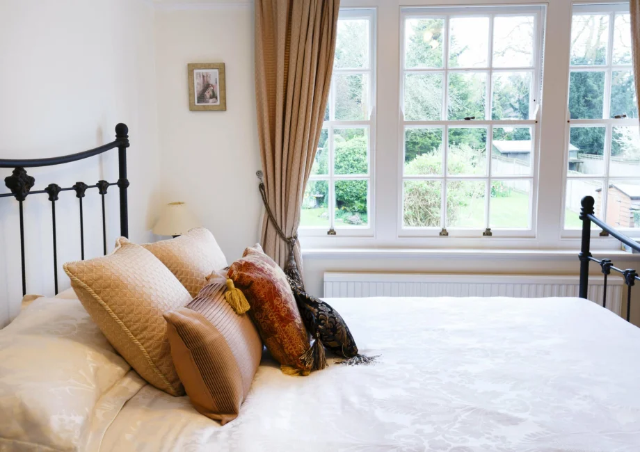 White sash window in bedroom