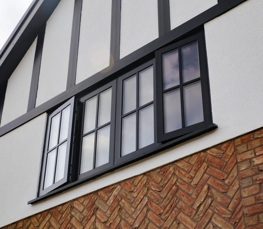 flush casement black aluk windows in manchester installed by alexander windows.