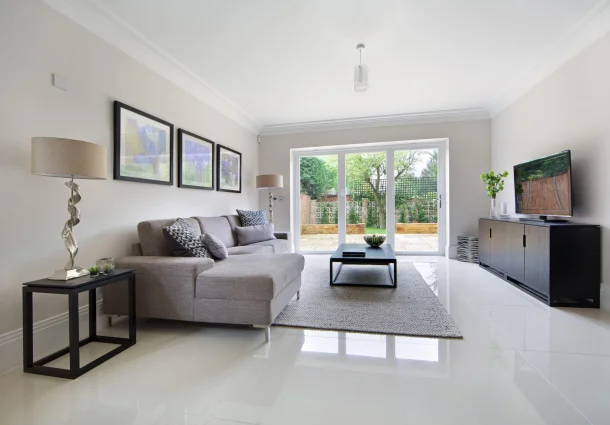 interior view of a white aluminium bifolding door in a modern lounge