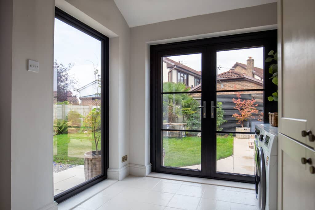 interior view of black aluminium French doors & picture window